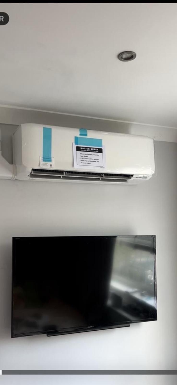 Wall-mounted split AC unit domestic installation