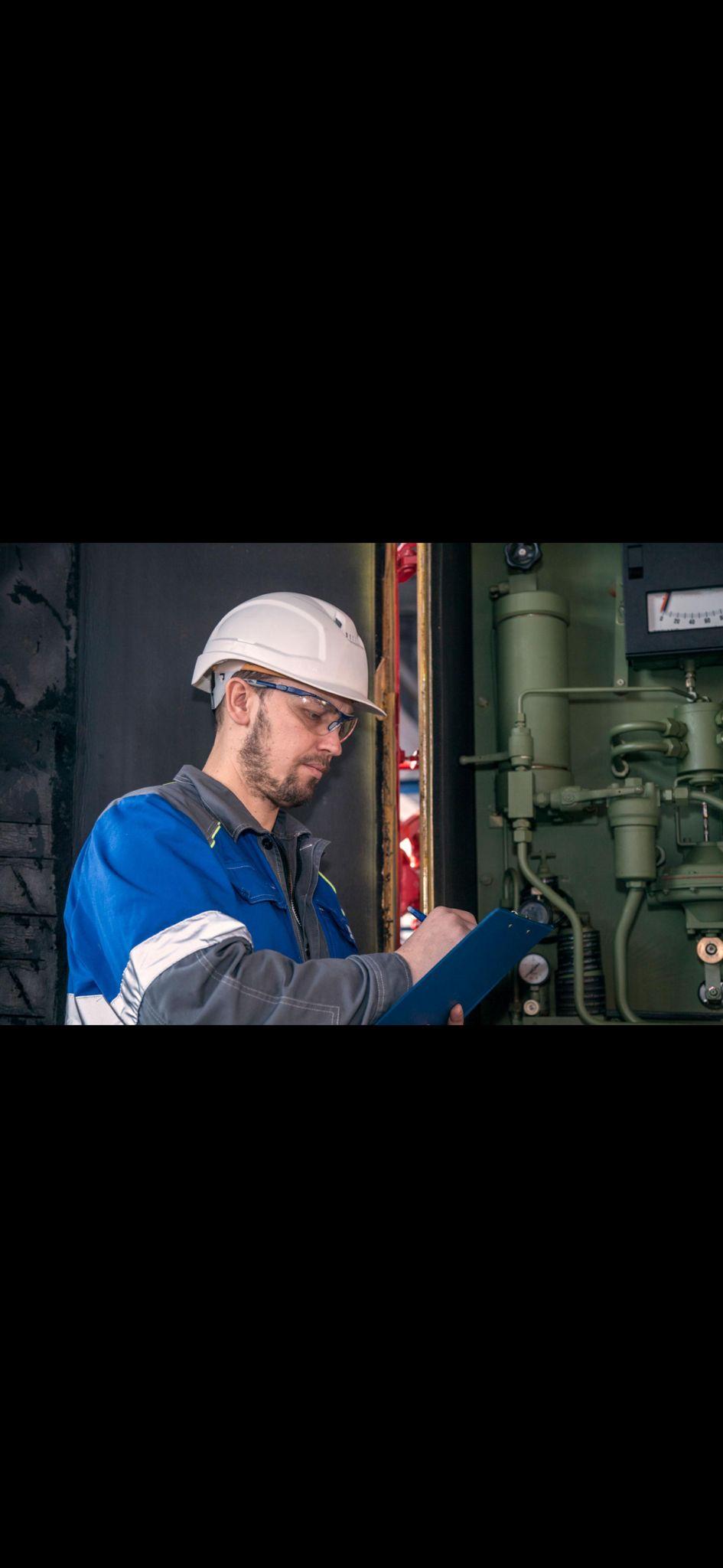 Engineer inspecting industrial fire suppression system